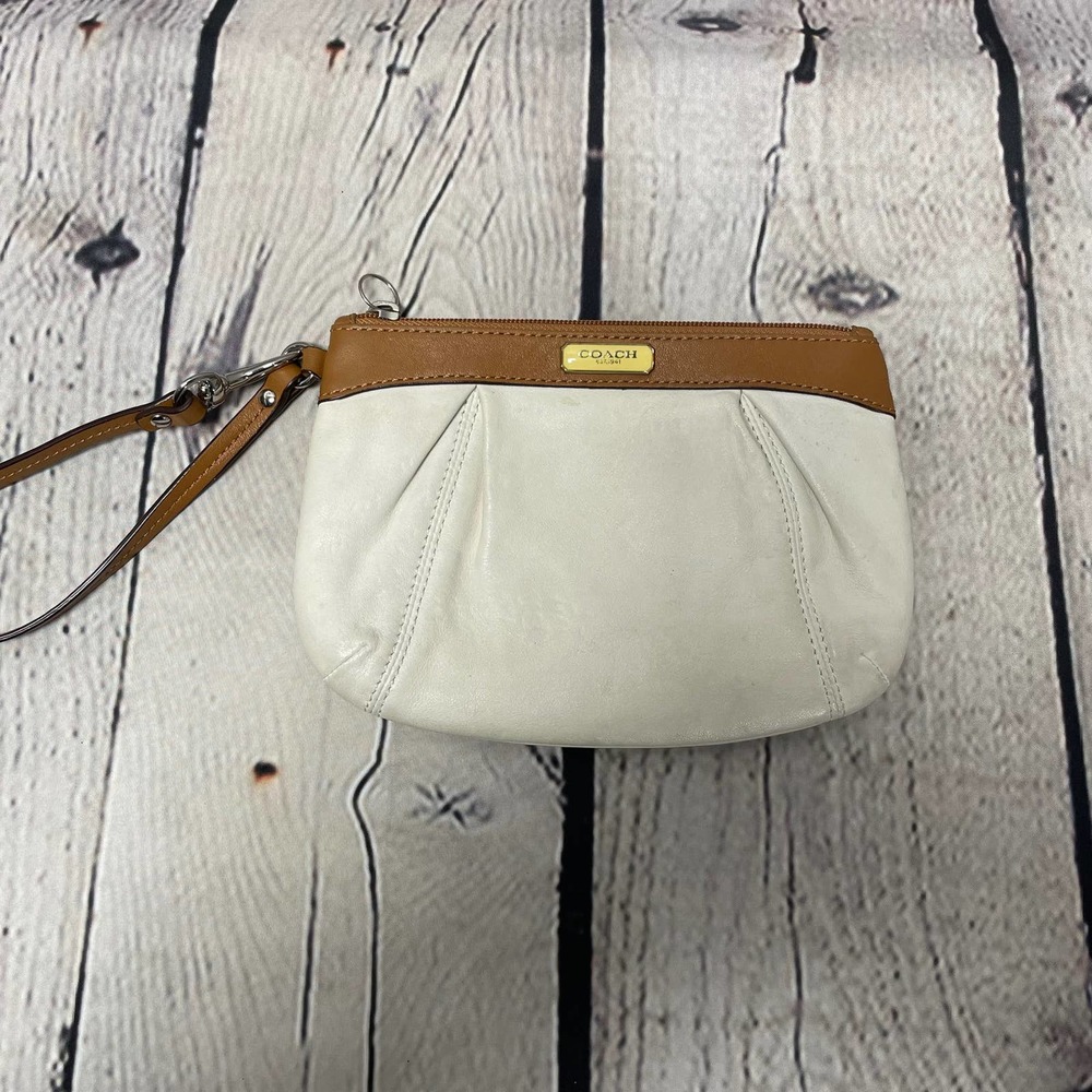 Coach small cream wristlet